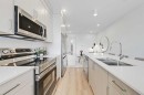 2-828 8 Avenue Ne, Calgary, AB  - Indoor Photo Showing Kitchen With Stainless Steel Kitchen With Double Sink With Upgraded Kitchen 