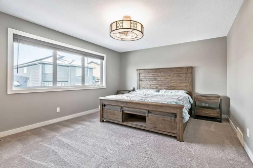 94 Cimarron Springs Circle, Okotoks, AB - Indoor Photo Showing Bedroom