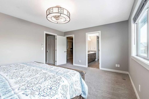 94 Cimarron Springs Circle, Okotoks, AB - Indoor Photo Showing Bedroom
