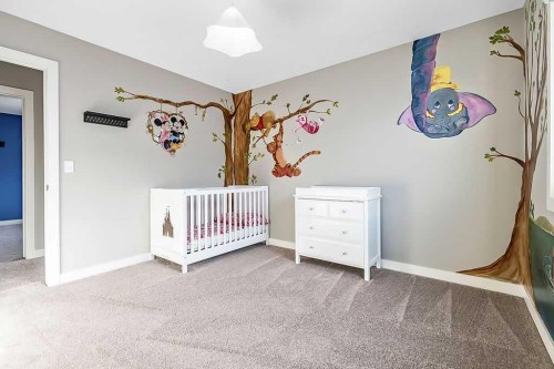 94 Cimarron Springs Circle, Okotoks, AB - Indoor Photo Showing Bedroom