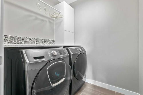 94 Cimarron Springs Circle, Okotoks, AB - Indoor Photo Showing Laundry Room