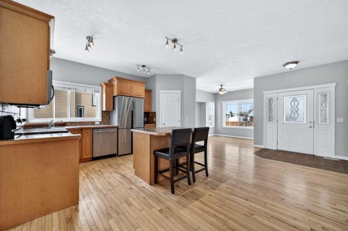 107 Strathmore Lakes Common, Strathmore, AB - Indoor Photo Showing Kitchen With Double Sink