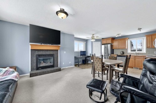 107 Strathmore Lakes Common, Strathmore, AB - Indoor With Fireplace