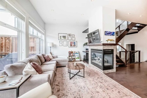 2807 25 Street Sw, Calgary, AB - Indoor Photo Showing Living Room With Fireplace