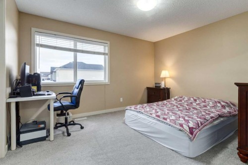 152 New Brighton Grove Se, Calgary, AB - Indoor Photo Showing Bedroom