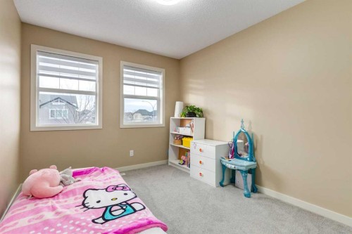152 New Brighton Grove Se, Calgary, AB - Indoor Photo Showing Bedroom