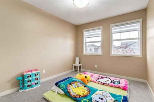 152 New Brighton Grove Se, Calgary, AB - Indoor Photo Showing Bedroom