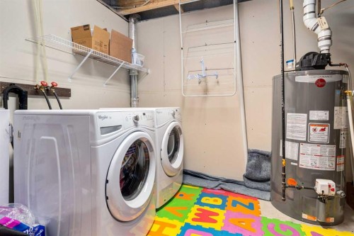 152 New Brighton Grove Se, Calgary, AB - Indoor Photo Showing Laundry Room