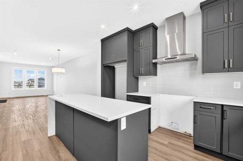 5001 Harmony Circle, Rural Rocky View County, AB - Indoor Photo Showing Kitchen With Upgraded Kitchen