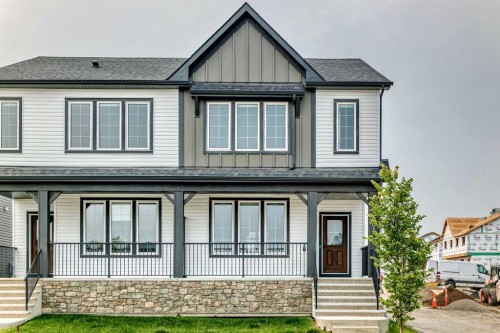 5001 Harmony Circle, Rural Rocky View County, AB - Outdoor With Deck Patio Veranda With Facade