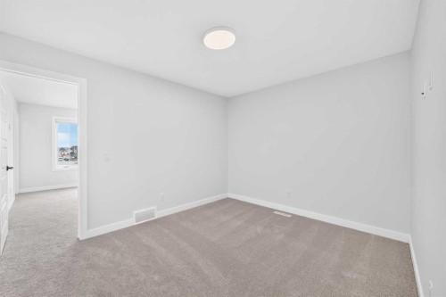 5001 Harmony Circle, Rural Rocky View County, AB - Indoor Photo Showing Other Room
