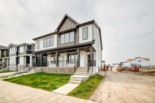 5001 Harmony Circle, Rural Rocky View County, AB - Outdoor With Deck Patio Veranda With Facade