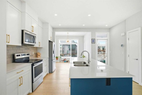 69 Sage Meadows Circle Nw, Calgary, AB - Indoor Photo Showing Kitchen With Double Sink With Upgraded Kitchen