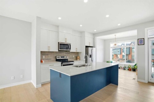 69 Sage Meadows Circle Nw, Calgary, AB - Indoor Photo Showing Kitchen With Double Sink With Upgraded Kitchen