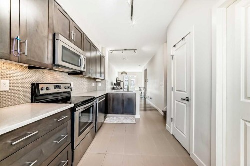 84 Sherwood Row Nw, Calgary, AB - Indoor Photo Showing Kitchen With Upgraded Kitchen