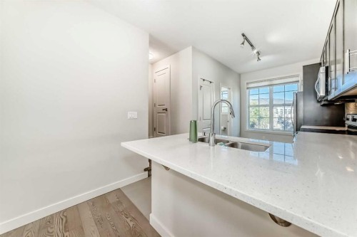 84 Sherwood Row Nw, Calgary, AB - Indoor Photo Showing Kitchen With Double Sink
