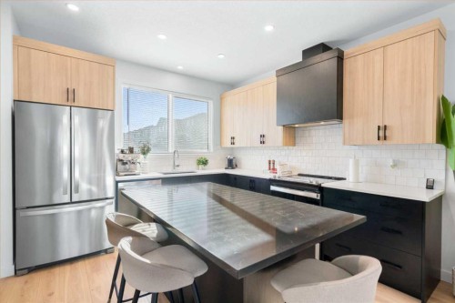 313 Ambleton Drive Nw, Calgary, AB - Indoor Photo Showing Kitchen With Stainless Steel Kitchen With Upgraded Kitchen