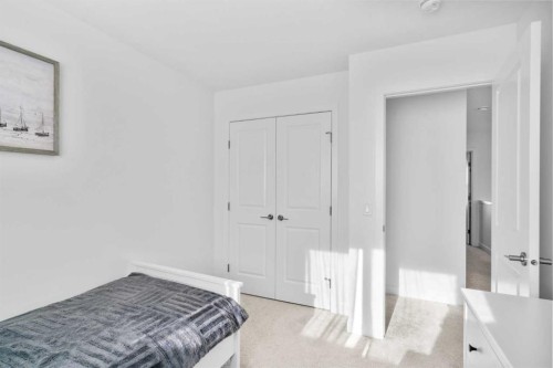 313 Ambleton Drive Nw, Calgary, AB - Indoor Photo Showing Bedroom