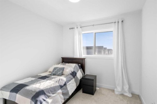 313 Ambleton Drive Nw, Calgary, AB - Indoor Photo Showing Bedroom