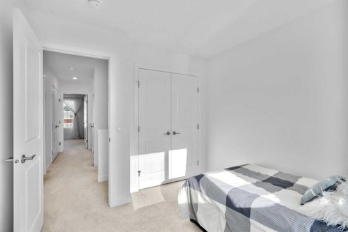 313 Ambleton Drive Nw, Calgary, AB - Indoor Photo Showing Bedroom