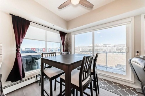 409-4150 Seton Drive Se, Calgary, AB - Indoor Photo Showing Dining Room