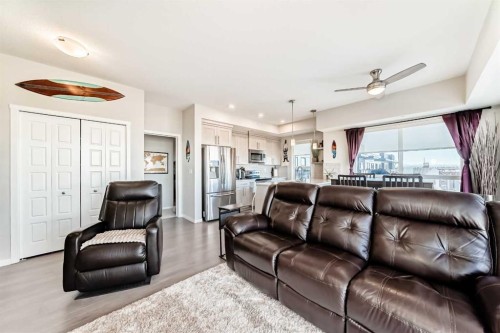 409-4150 Seton Drive Se, Calgary, AB - Indoor Photo Showing Living Room