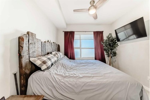 409-4150 Seton Drive Se, Calgary, AB - Indoor Photo Showing Bedroom