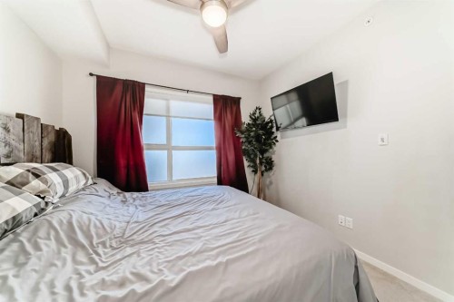 409-4150 Seton Drive Se, Calgary, AB - Indoor Photo Showing Bedroom