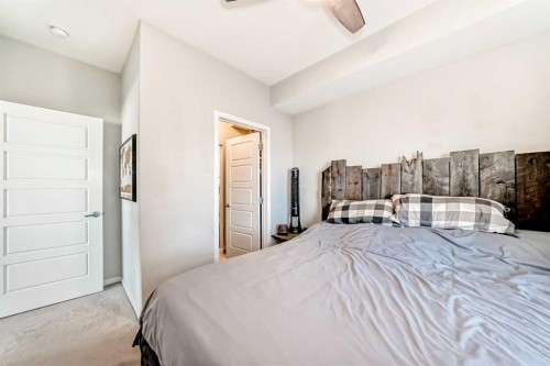 409-4150 Seton Drive Se, Calgary, AB - Indoor Photo Showing Bedroom