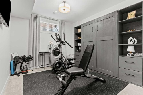 47 Wolf Willow Boulevard Se, Calgary, AB - Indoor Photo Showing Gym Room