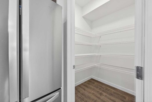 56 Creekside Drive Sw, Calgary, AB - Indoor With Storage