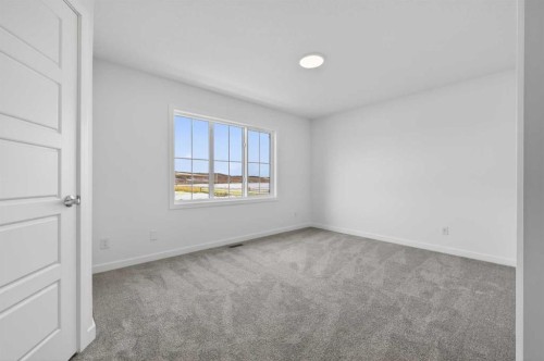 56 Creekside Drive Sw, Calgary, AB - Indoor Photo Showing Other Room