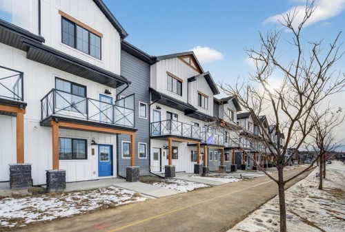 56 Creekside Drive Sw, Calgary, AB - Outdoor With Balcony