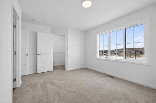 56 Creekside Drive Sw, Calgary, AB - Indoor Photo Showing Other Room