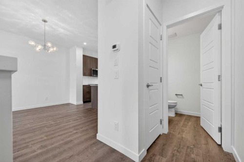 56 Creekside Drive Sw, Calgary, AB - Indoor Photo Showing Other Room