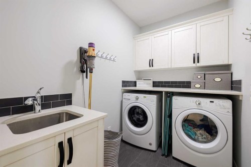 155 Crestridge Hill Sw, Calgary, AB - Indoor Photo Showing Laundry Room