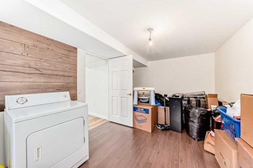 294 Elgin View Se, Calgary, AB - Indoor Photo Showing Laundry Room