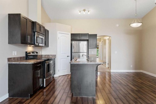 2203-230 Eversyde Boulevard Sw, Calgary, AB - Indoor Photo Showing Kitchen With Stainless Steel Kitchen