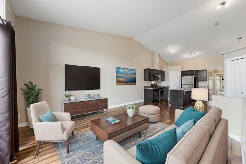 2203-230 Eversyde Boulevard Sw, Calgary, AB - Indoor Photo Showing Living Room