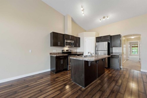 2203-230 Eversyde Boulevard Sw, Calgary, AB - Indoor Photo Showing Kitchen With Stainless Steel Kitchen