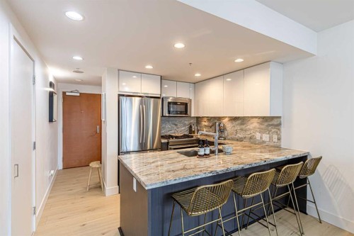 205-519 Riverfront Avenue Se, Calgary, AB - Indoor Photo Showing Kitchen With Stainless Steel Kitchen With Upgraded Kitchen