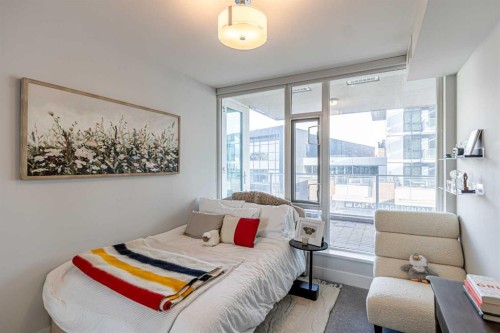 205-519 Riverfront Avenue Se, Calgary, AB - Indoor Photo Showing Bedroom