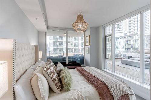 205-519 Riverfront Avenue Se, Calgary, AB - Indoor Photo Showing Bedroom