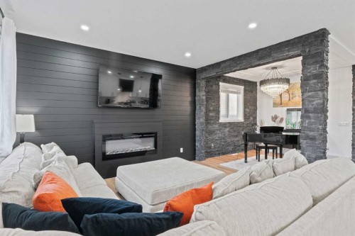 818 Edgefield Street, Strathmore, AB - Indoor Photo Showing Living Room With Fireplace