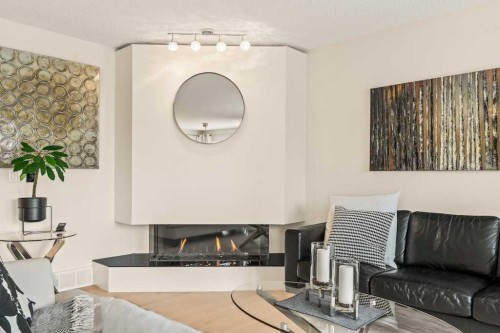 18 Simcoe Terrace Sw, Calgary, AB - Indoor Photo Showing Living Room