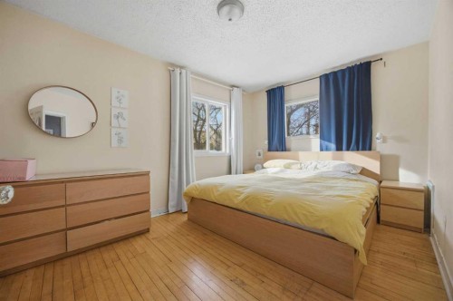 1339 11 Avenue Se, Calgary, AB - Indoor Photo Showing Bedroom