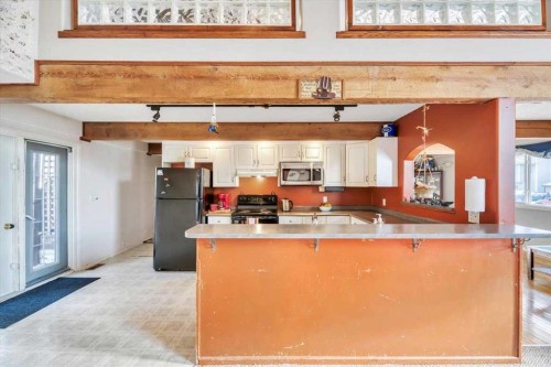 427 Cole Crescent, Carseland, AB - Indoor Photo Showing Kitchen With Double Sink