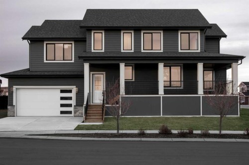 28 Sunvalley View, Cochrane, AB - Outdoor With Facade