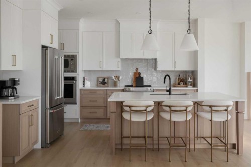 28 Sunvalley View, Cochrane, AB - Indoor Photo Showing Kitchen With Stainless Steel Kitchen With Upgraded Kitchen