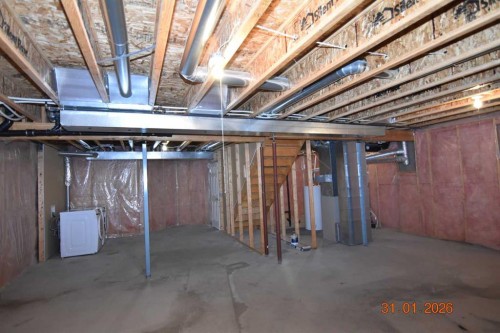 78 Somerglen Way Sw, Calgary, AB - Indoor Photo Showing Basement